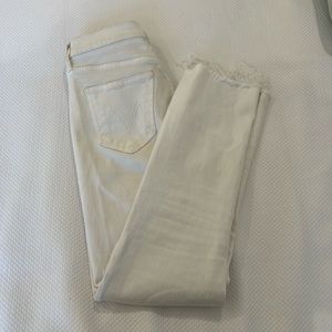 SIZE 25 mother jeans in white, minor staining burning bleached could be removed